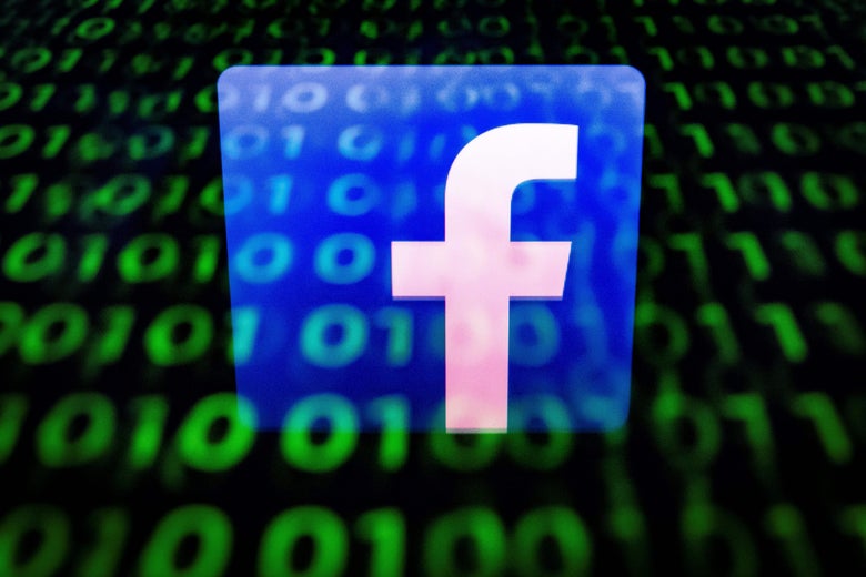 The Facebook logo faded over a screen of binary code